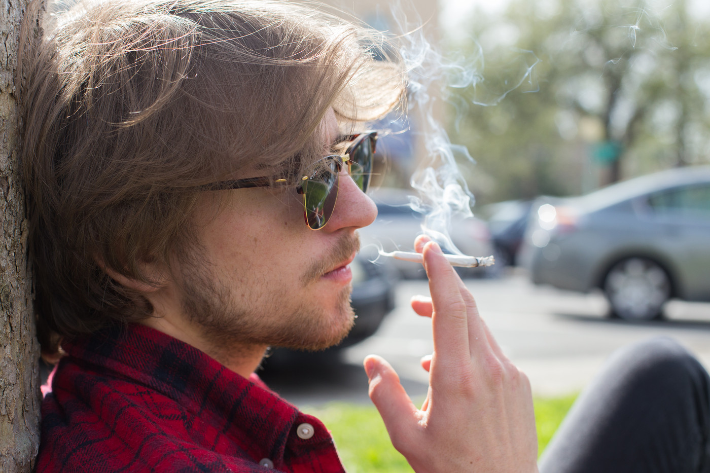 City College student Marton Radics, music major, smokes a hand-rolled cigarette in front of City College on March 14, 2016. Hector Flores, Staff Photographer. | hectorfloresexpress@gmail.com