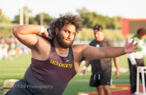 Emmanuel Martinez, City College sophomore competing in the shot put at the Big 8 Championships at Hughes Stadium on Apr. 27th ©2017 Dianne Rose
