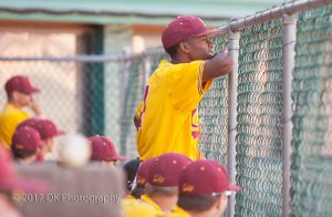 Kyle Finger, City College freshman outfielder watches from the dugout in the final regular season game against Delta College at Union Stadium on Apr. 28th ©2017 Dianne Rose