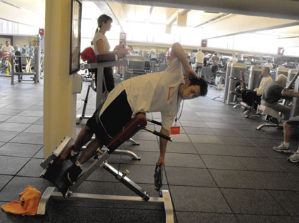 Dominick Lopez works hard on his obliques Feb. 25 in Fitness 371 in the North Gym