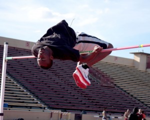 City College Track & Field performer Fletcher Carlisle won the High Jump and Long Jump competitions on Feb. 20.  Shown here, clearing the pole in High Jump practice in preparation for the up coming track meet at Hughes Stadium. photo by Windee Dawson