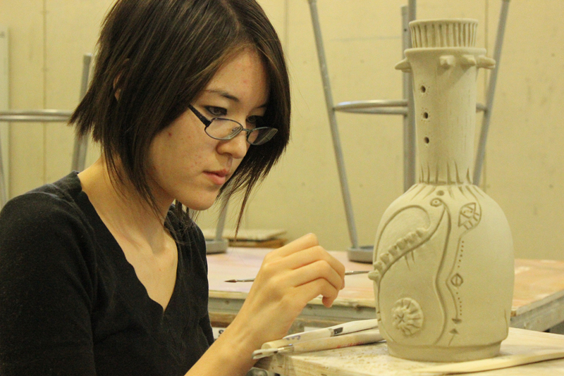 PICTURE OF THE DAY-Oct. 8, 2012.  Alisha Arita, 19, art major, carefully works on her ceramic art piece during lab time for beginning ceramics located in FIA. Tony Wallin | dylanwaittswallin.express@gmail.com