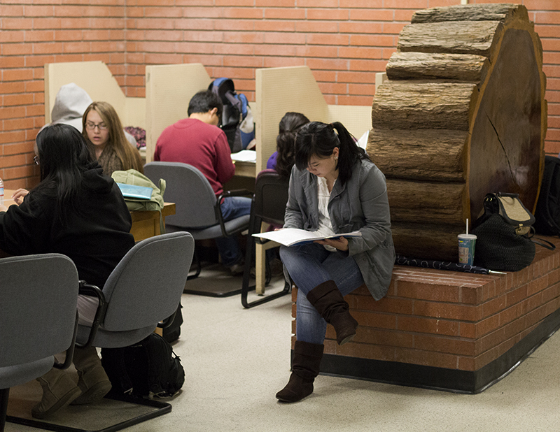 A group of students study in the hallways of Mohr Hall.