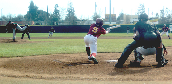 City College Panthers outfielder, Marc Fackrell, lays down a successful bunt during their 6-4 win on Saturday Feb. 2 against Fresno CIty Rams. T.William Wallin | wallintony@yahoo.com