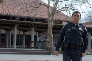 Sargeant Hien Nguyen crosses the City College quad, looking for another officer, after responding to a request to appear in the financial aid lab inside the business building. | Callib Carver | callibcarver.express@gmail.com