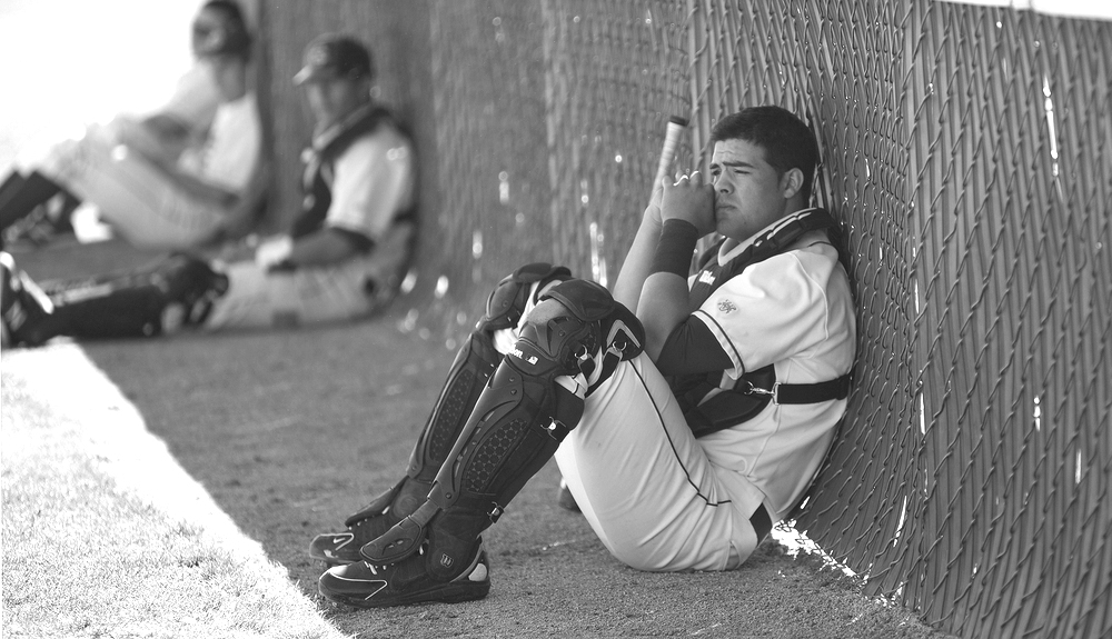 Freshman infielder/catcher Jerrod Bravo of City College takes a few minutes to meditate on the up coming game against Los Medanos College at Union Stadium Feb .26
