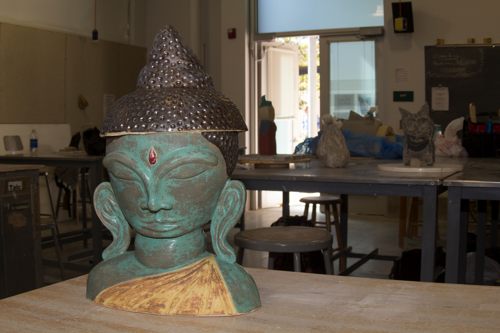 PICTURE+OF+THE+DAY+%E2%80%93+4%2F9%2F13+Enlightenment+Soup.+A+ceramic+Buddha+Head+created+by+Kim+Richardson+for+ART+391%3A+Intermediate+Ceramics%2C+located+in+FIA+130.++Richardson+plans+to+serve+vegetarian+soup+in+the+bowl+hidden+within+the+sculpture.+%7C+Evan+E.+Duran+%7C+evaneduran%40gmail.com