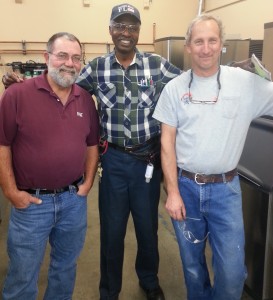 (From left), Jon Zeh, Roosevelt Jones and Matt Milan are instructional assistants in the Mechanical Electrical Training department.