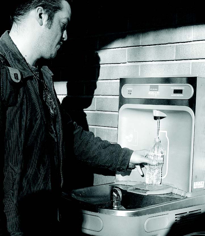 City College student Tony Gonzales, undeclared, fills
his water bottle from the new drinking fountain. Photo by Dianne Rose | Staff Photographer | dianne.rose.express@gmail.com