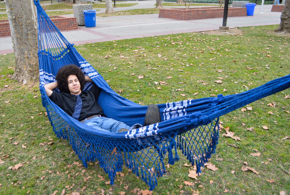 Student+Grant+Wellner+takes+a+break+between+classes+on+a+hammock+he+has+brought+from+home.+Major%3A+CSU+transfer%2FAirforce.+Emma+Foley+%7C+Staff+Photogrpaher