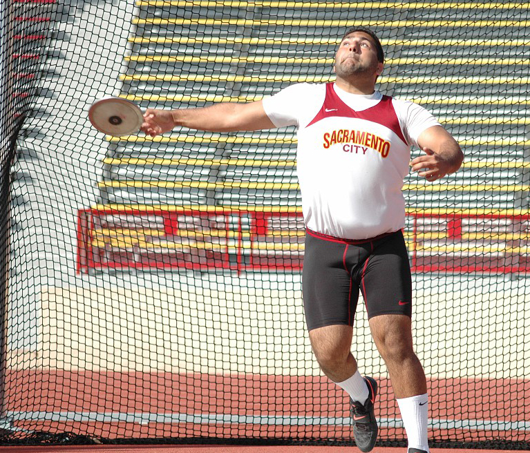 City Colleges track and field thrower Henry Sharoyan throws discus Feb. 22 during the SCC Opener 2014 at Hughes Stadium.