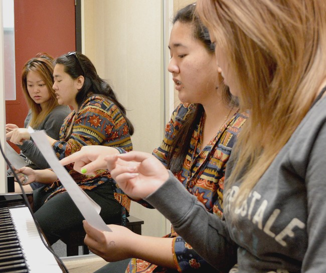 Dental hygienist major Julie Xiong (right) practices opera in a practice room in the Perfoming Arts Center for her advanced vocal class March 13 with physical therapy major Angla Ikeda. Photo by Luisa Morco | Staff Photographer | luisamorcoexpress@gmail.com