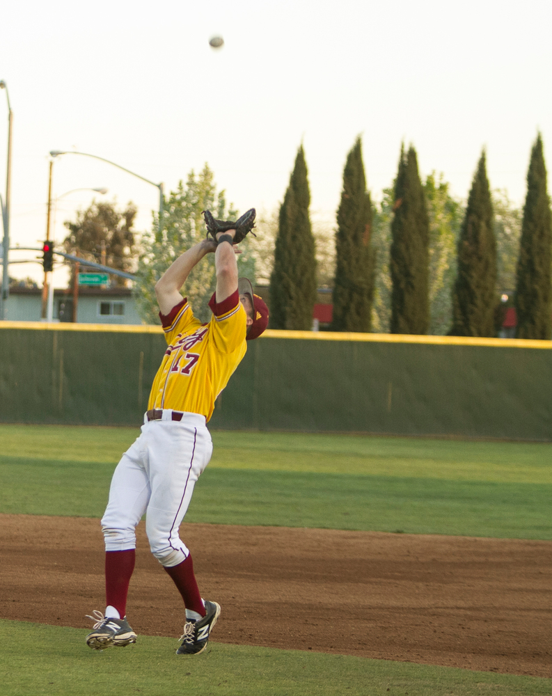 Panthers+outfielder+Robby+Link+jumps+to+catch+a+fly+ball+during+the+home+game+against+Reedley+College+March+7+at+Union+Stadium.%0A%0APhoto+by+Tamara+M.+Knox+%7C+Online+Photo+Editor+%7C+tknox%40gmail.com