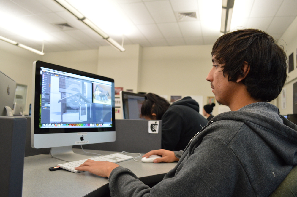 David Virga works in the technology departments computer lab March 31 to create a mill from modo for game art. Virga hopes to earn his Game Design Certificate by Fall 2014. Luisa Morco | Staff Photographer | luisamorco.express@gmail.com