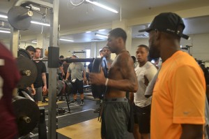 City College's football team prepares for the season by tackling the weight room. 