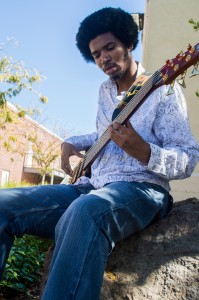 City College student Ellwood Allen Jr. has been playing guitar for three years. He plays his electric guitar on his spare time outside the cosmetology building. | Emily Foley | Staff Photographer | emmajfoley@gmail.com  