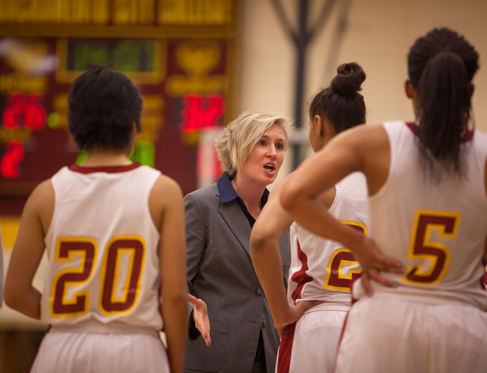 Julia Allender, City College head coach, talks with Aleea Reese, City College freshman forward, during a timeout in the second half of the home game against American River College at the North Gym on Jan. 6th. Photo by Dianne Rose / dianne.rose.express@gmail.com
