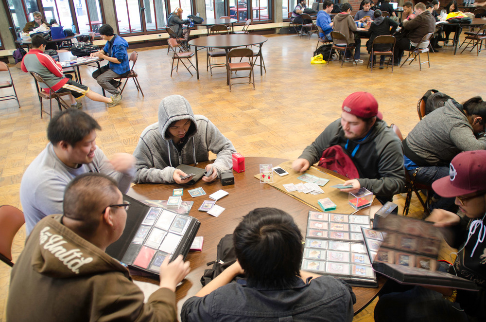 A group of students playing YUGIOH in the Student Center | Christopher Williams | Staff Photographer | Chris@christophercarlwilliams.com