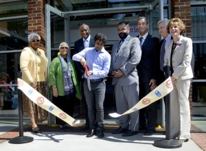 City College commemoration ceremony takes place today for the grand opening of the new student services, photography and journalism department May 8, 2015. President of the student senate, Sandeep Singh, cuts the ribbon to signify the official opening of the new building. Emily Foley | Photo Editor 