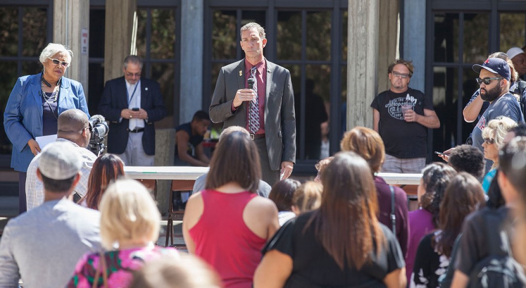 Los Rios Chancellor, Brian King, answers questions and concerns from students at the Love In on the quad at City College Sep. 5, 2015 after yeserdays fatal shooting on campus. Vanessa Nelson | Photo Editor | vanessanelsonexpress@gmail.com
