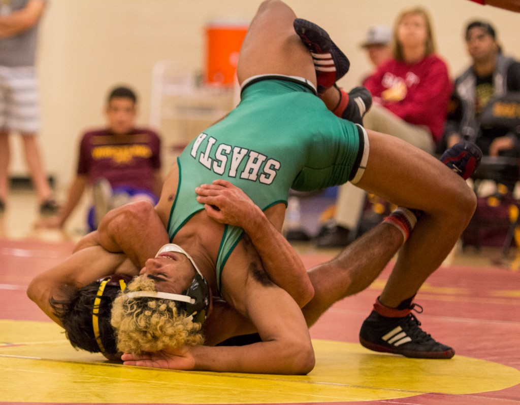Shasta+Colleges+Jamal+Halverson+flips+out+of+City+Colleges+Dylan+Forzani+hold+during+their+match+in+the+North+Gym+Oct.+14.+%28Photo+by%3A+Kristopher+Hooks+%7C+khooksexpress%40gmail.com%29