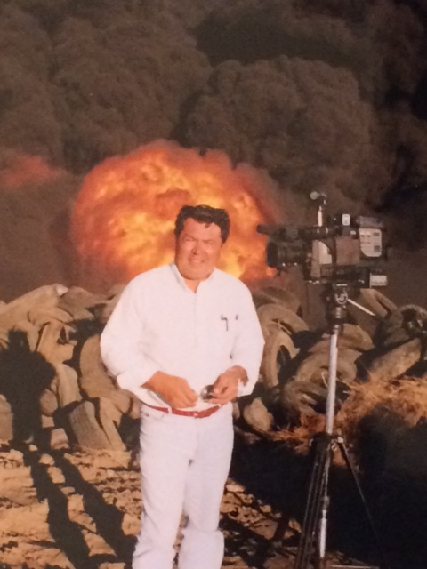 Rich Ibarra prepares to report for KCRA 3, one of the local television stations he worked for, from the scene of a fire (Photo Courtesy: Rich Ibarra)