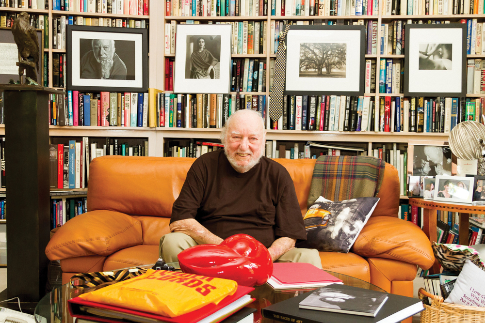 Russ Solomon, founder of Tower Records, sits on the couch in his home library. (Photo by Tammy Kaley)