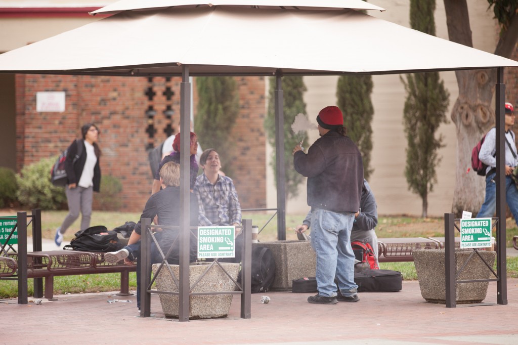 City College students gathered in the Designated Smoking Area provided for them on campus Oct. 27. Vanessa S. Nelson | Photo Editor | vanessanelsonexpress@gmail.com