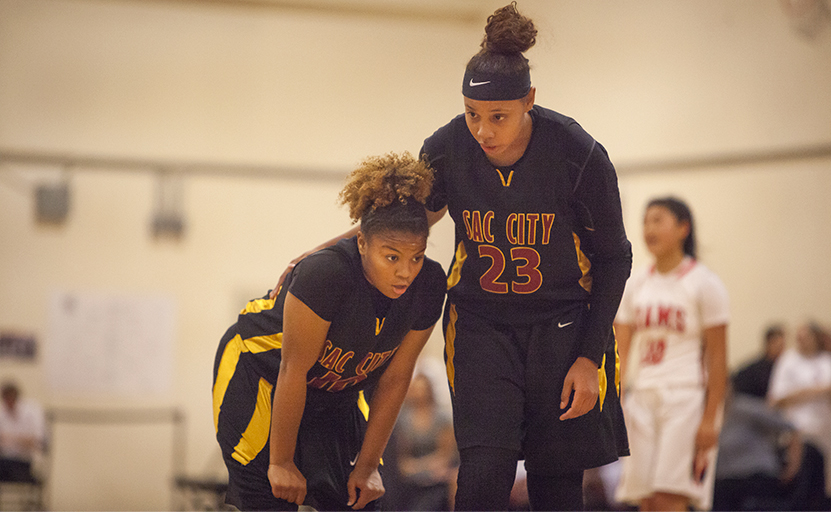 City College teammates Mikaila Royster (left) and Aleea Reese discuss the play during the fourth quarter of the game against San Francisco City College Nov. 21. Photo by Dianne Rose | dianne.rose.express@gmail.com