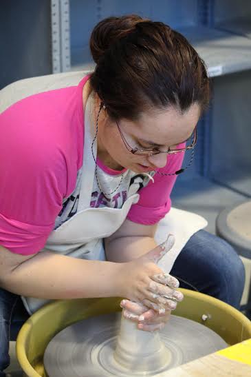 City College student, Nicole Hiatt, art major, throwing a bowl in Intermediate Ceramics Wheel Throwing. Julie Jorgensen, Photo Editor. | juliejorgensenexpress@gmail.com