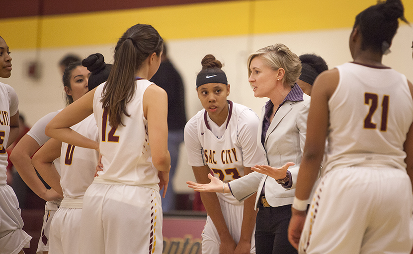 City College head coach Julia Allender talks to the team during a time out early in the third quarter in the game against Santa Rosa College in the North Gym on Jan. 22. Photos by Dianne Rose