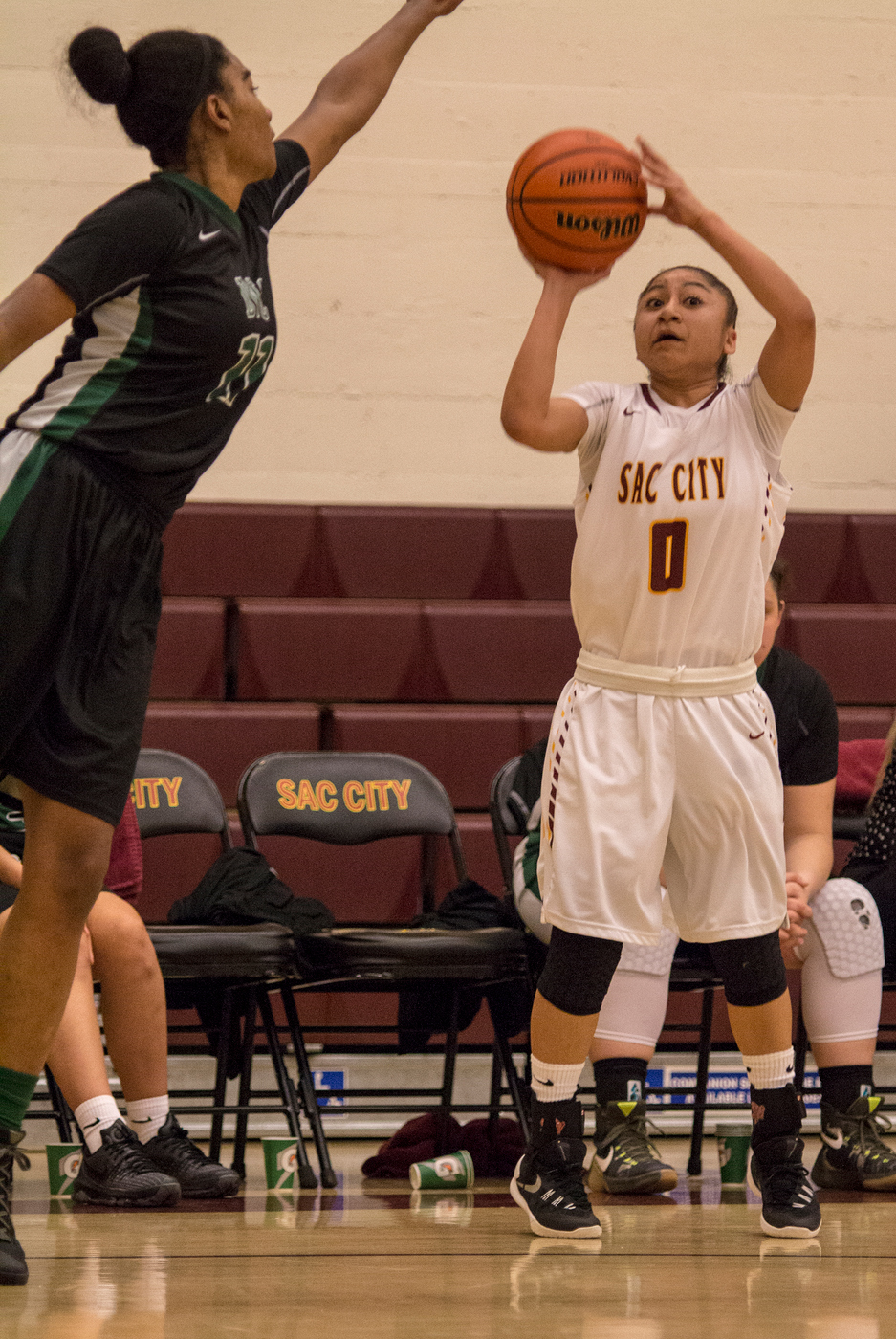 City College guard Corina Tacardon shoots a 3-pointer during the game against Diablo Valley College on Feb. 11, 2016. (Photo Courtesy: Kris Hooks | khooks3825@gmail.com)