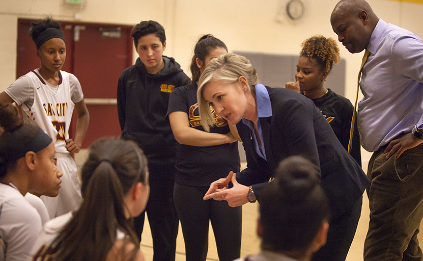 City College head coach Julia Allender talks with the team during a time out in the second half of the game against Modesto College in the North Gym on Feb. 2nd. Photos by Dianne Rose