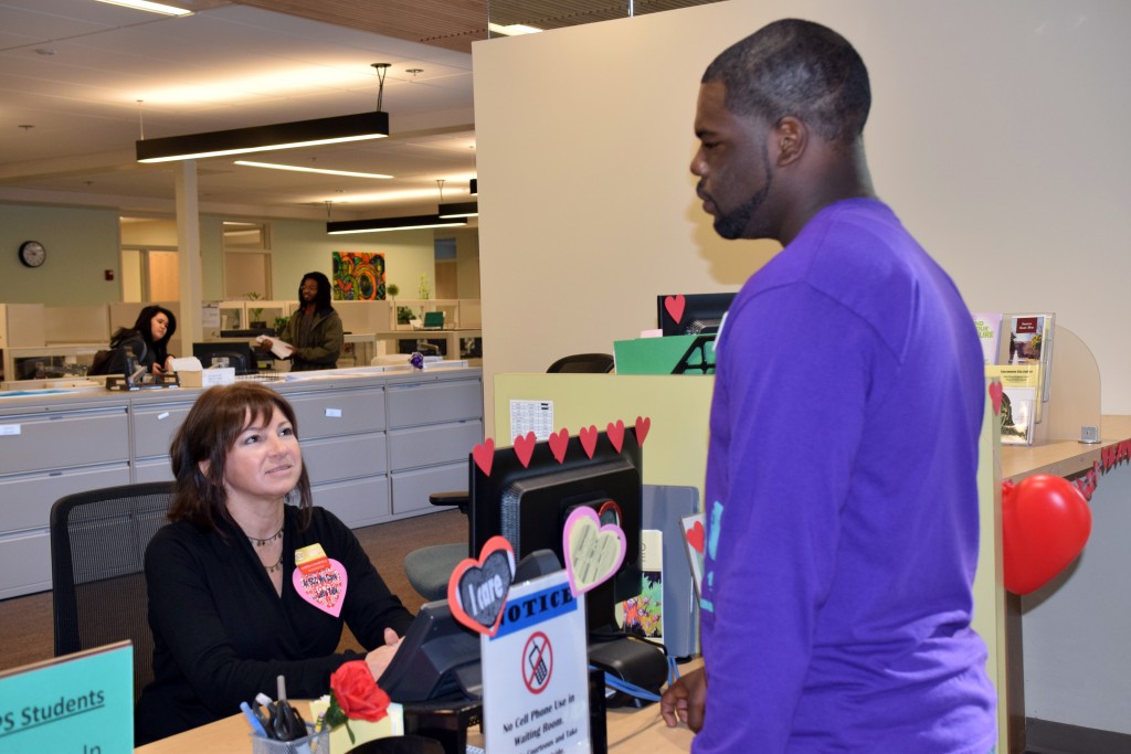 City College student Donnaven Bradley, history major, talking to Marina Zanardelli, disability service counselor clerk, about what the disability service program can provided for students. Genoira Lundy, Staff Photographer. | genoiralundyexpress@gmail.com