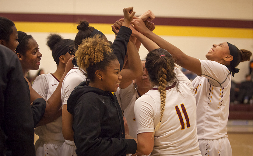 City College celebrates in the come back win against Delta College in the North Gym on Jan. 15th.  Photos by Dianne Rose