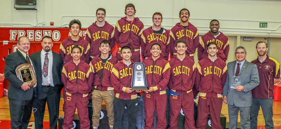 The City College wrestling team poses for its celebratory photo after defeating heavily favored Fresno City College for the state title.
Photos courtesy of John Sachs · tech-fall.com