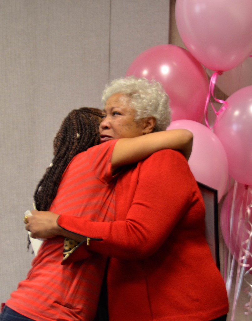 City College Student Senate President Marianna Sousa hugging after reading a letter and poem to Dr. Kathryn Jeffery at Dr. Jefferys reception on Thursday afternoon Jan. 28, 2016 Barbara Williams, staff photgrapher. | BarbarajExpress@gmail.com