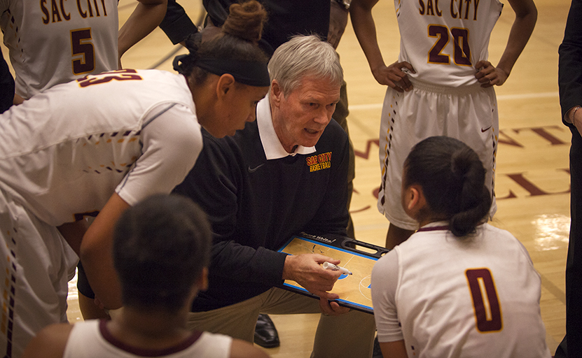 City College assistant coach Bob Roehl goes over play during a time out in the fourth quarter in the game against Delta College in the North Gym on Jan. 15th.  Photos by Dianne Rose