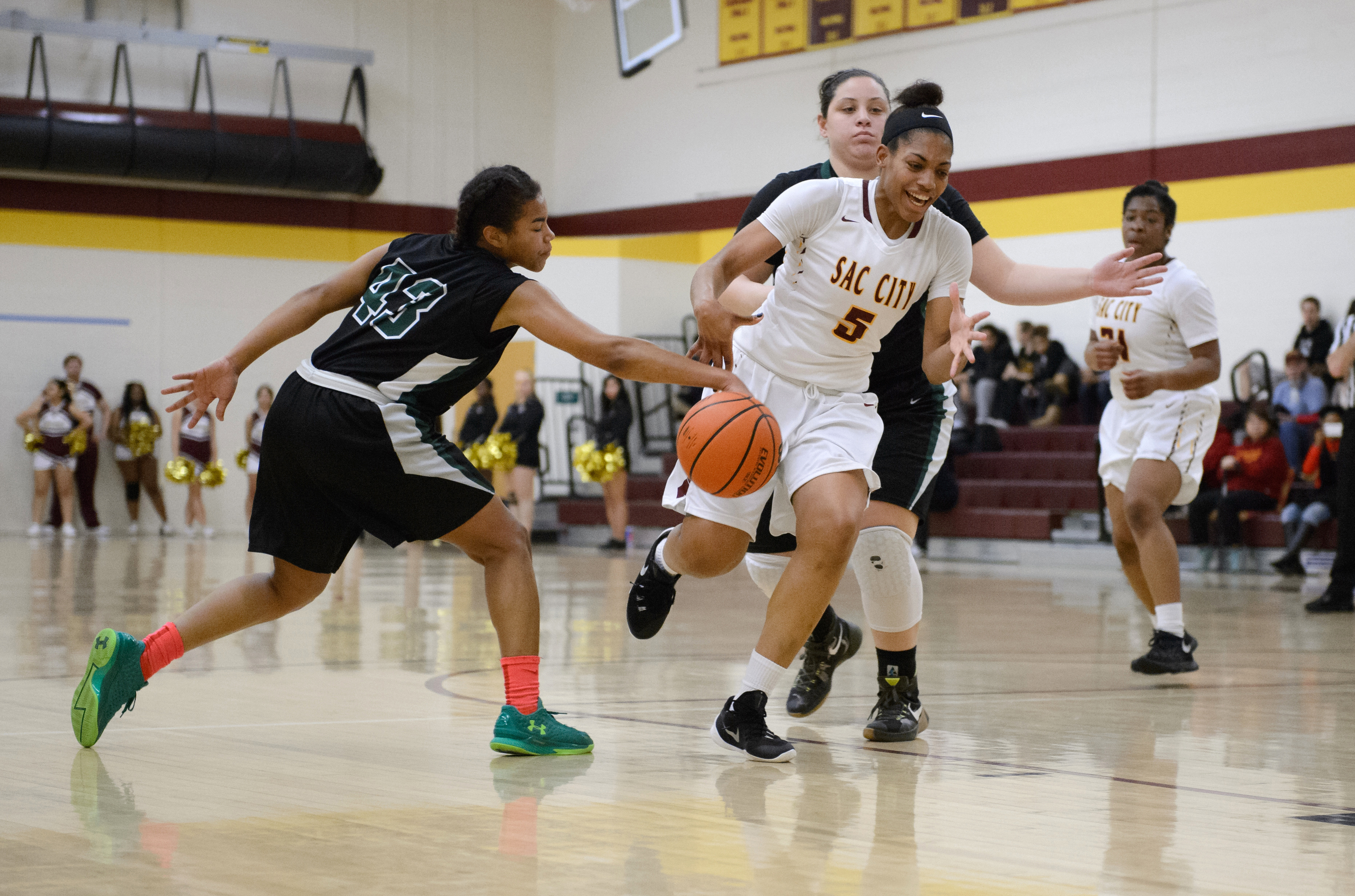 City College sophmore forward Erica Foster brings ball up court on Thursdays Feb. 11 game against Diablo Valley, the Panthers went on to win 67-58. Photo by Theresa Ratermann • Guest Photographer
