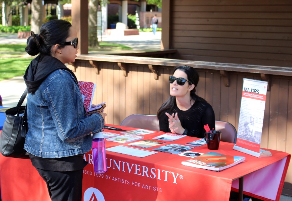 City College student Emilee Vergara, theater technology and design major, talking to Academy of Art University outreach representative Ashley Cook about the different majors they offer at their college. Julie Jorgensen, Photo Editor. | juliejorgensenexpress@gmail.com