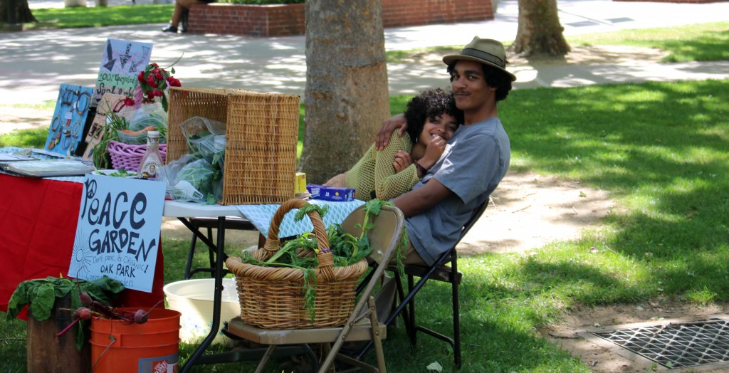 City College students Anthony Rutherford, sustainable agriculture & farming major and Amina Malika, botany major are enjoying their time at Earth Week in the Quad as representatives of Peace Garden. Julie Jorgensen, Photo Editor. | juliejorgensenexpress@gmail.com