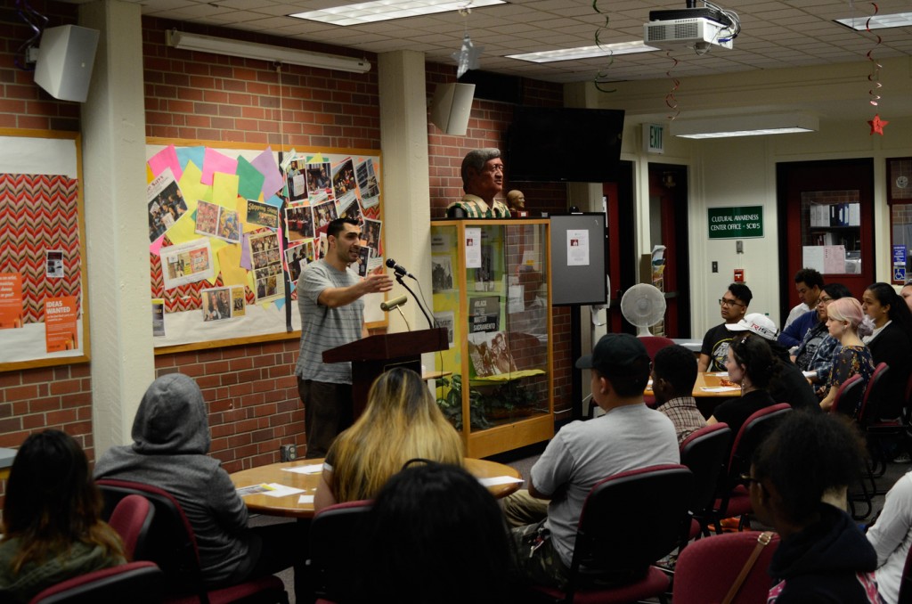 Remi Kanazi, Palestinian-American performance poet, talking and  performing to City College students in Cultural Awareness Center about his recently released poetry. The poems are from his book Before The Next Bomb Drops Rising Up From Brooklyn To Palestine. Feb. 24, 2016. Chris Williams, Staff Photographer. |Chriswexpress@gmail.com