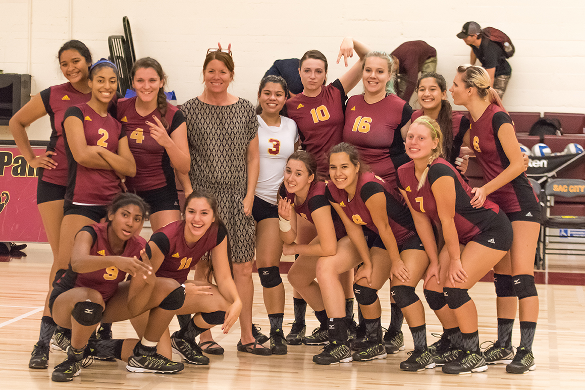 Head Coach Laurie Nash and City College's Volleyball Team in the North Gym on Sept. 7, 2016 after their victory over Shasta College to mark the 300th win of Coach Nash's tenure at City College. Photo by Brian Fox 
