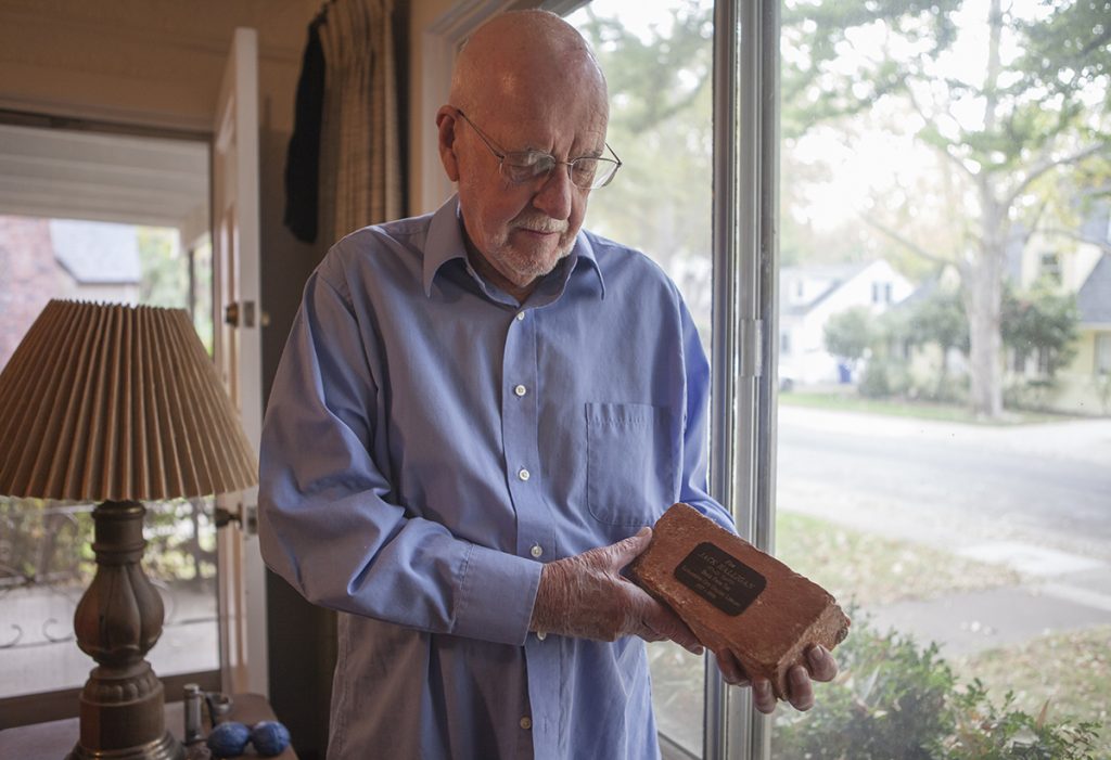 Former City College librarian Jack Halligan in his home, holding a brick from the former Sacramento City College Library that stood from 1937-1996.
Vanessa S. Nelson | vanessanelsonexpress@gmail.com
