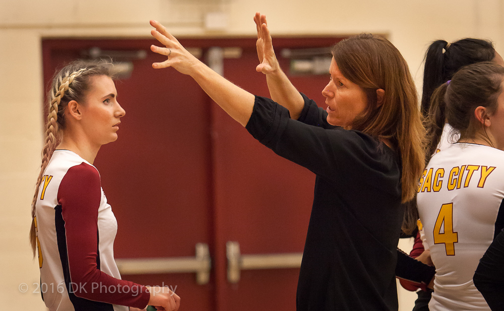 Svetlana Varkentin listens as City College head coach Laurie Nash talks about blocking at the net in the match against Santa Rosa College at North Gym on Sept. 30th. ©2016 Dianne Rose