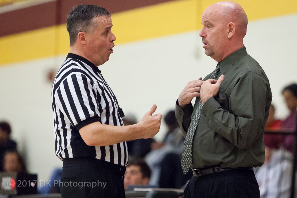 City College head coach Andrew Jones talks with ref during the game against American River College at the North Gym on Jan. 24th ©2017 Dianne Rose