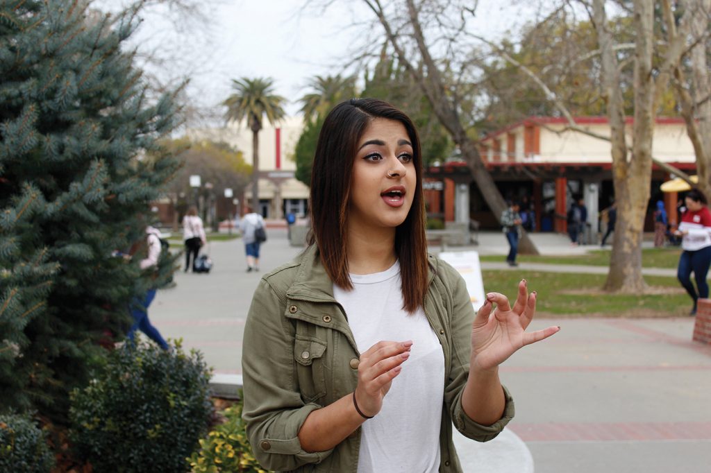 City College student Puneet Purewal reacts to Donald Trump’s presidency. In light of President Trump’s election she said will be paying closer attention to politics. | Photo by Pedro Santander · psantander.express@gmail.com
    City College student Puneet Purewal reacts to Donald Trump’s presidency. In light of President Trump’s election she said will be paying closer attention
    to politics. Pedro Santander | Staff Photographer | psantander.express@gmail.com