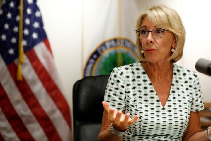 Photo via Time.com | Education Secretary Betsy DeVos speaks with the media after a series of listening sessions about campus sexual violence, Thursday, July 13, 2017, in Washington. (AP Photo/Alex Brandon)