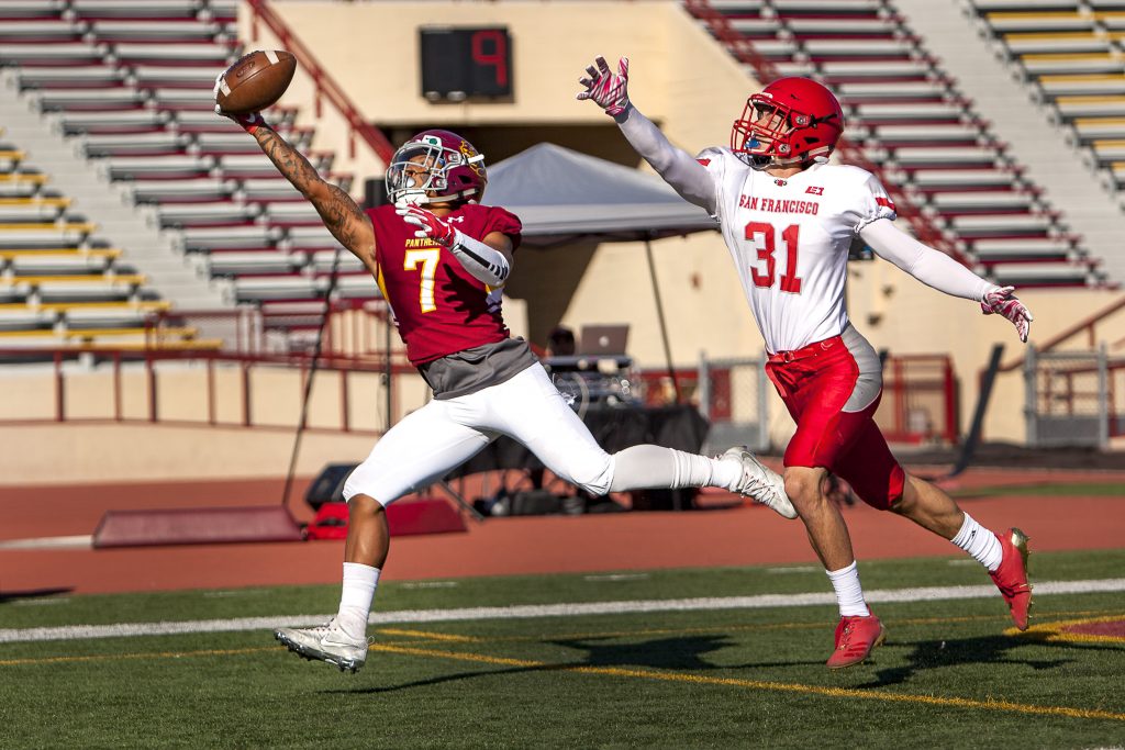 Jordan Moore (7), City College sophomore wide receiver makes the catch for a touchdown in the the first half of the Capital City Bowl against San Francisco College at Hughes Stadium on Nov. 18. ©2017 Dianne Rose