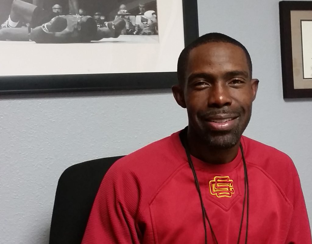 City College head football coach Dannie Walker in his office. Walker sat down with saccityexpress Nick Pecoraro to talk team culture.